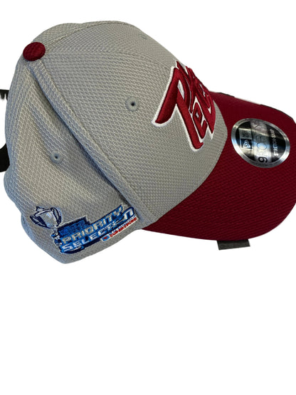 Gray and maroon baseball cap with branding on a white background